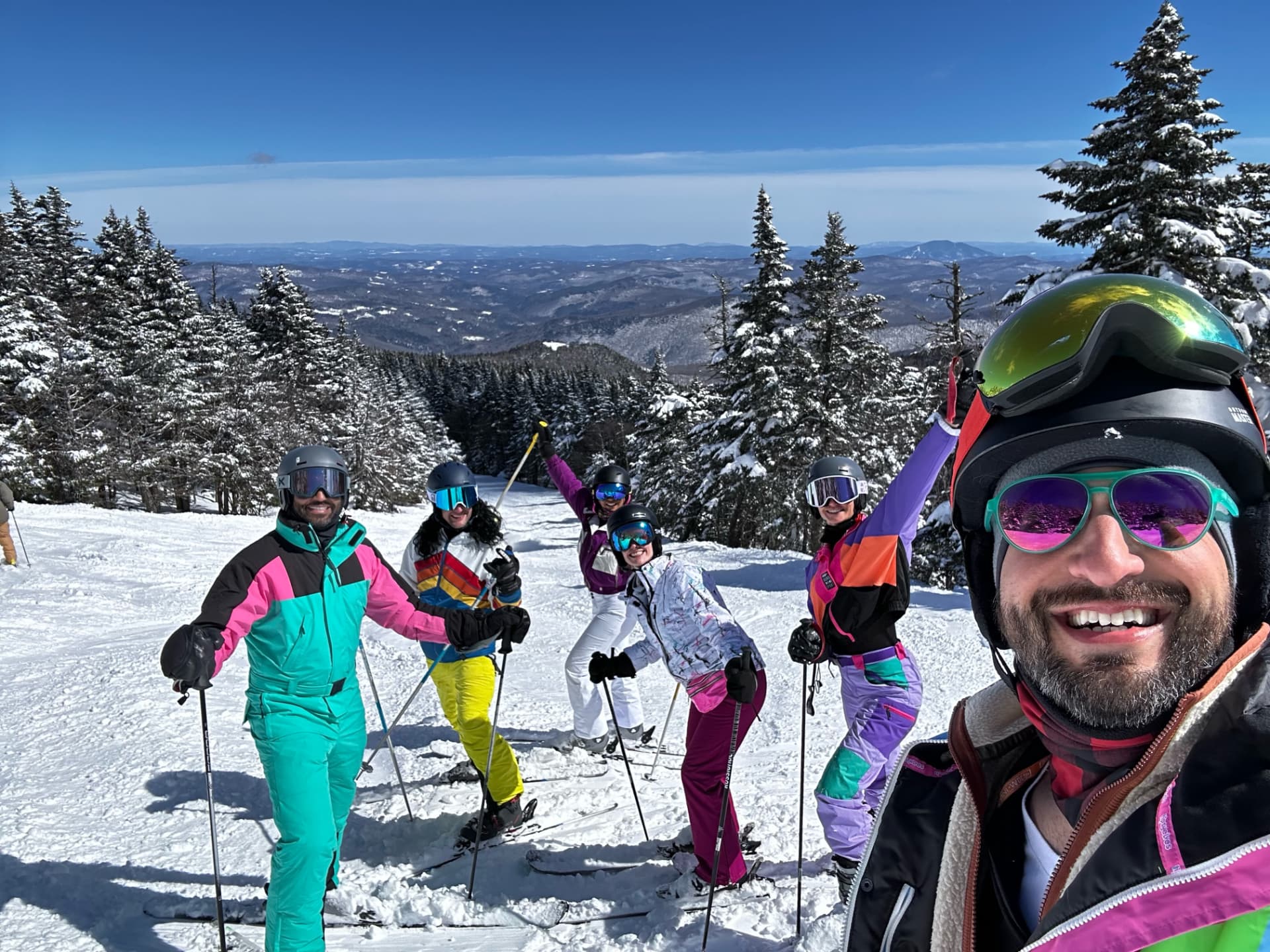 Group of skiers in colorful retro gear at Killington